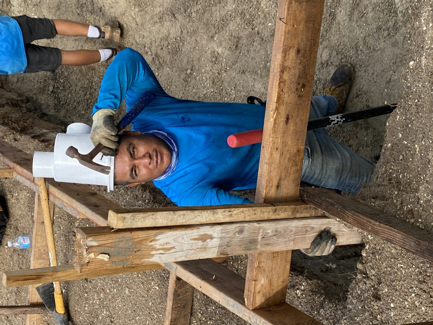 Picture of employee being silly at a job site. We are always trying to make each other laugh. 