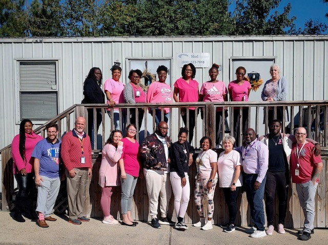 Staff supporting Breast Cancer Awareness Month with Pink Out Day