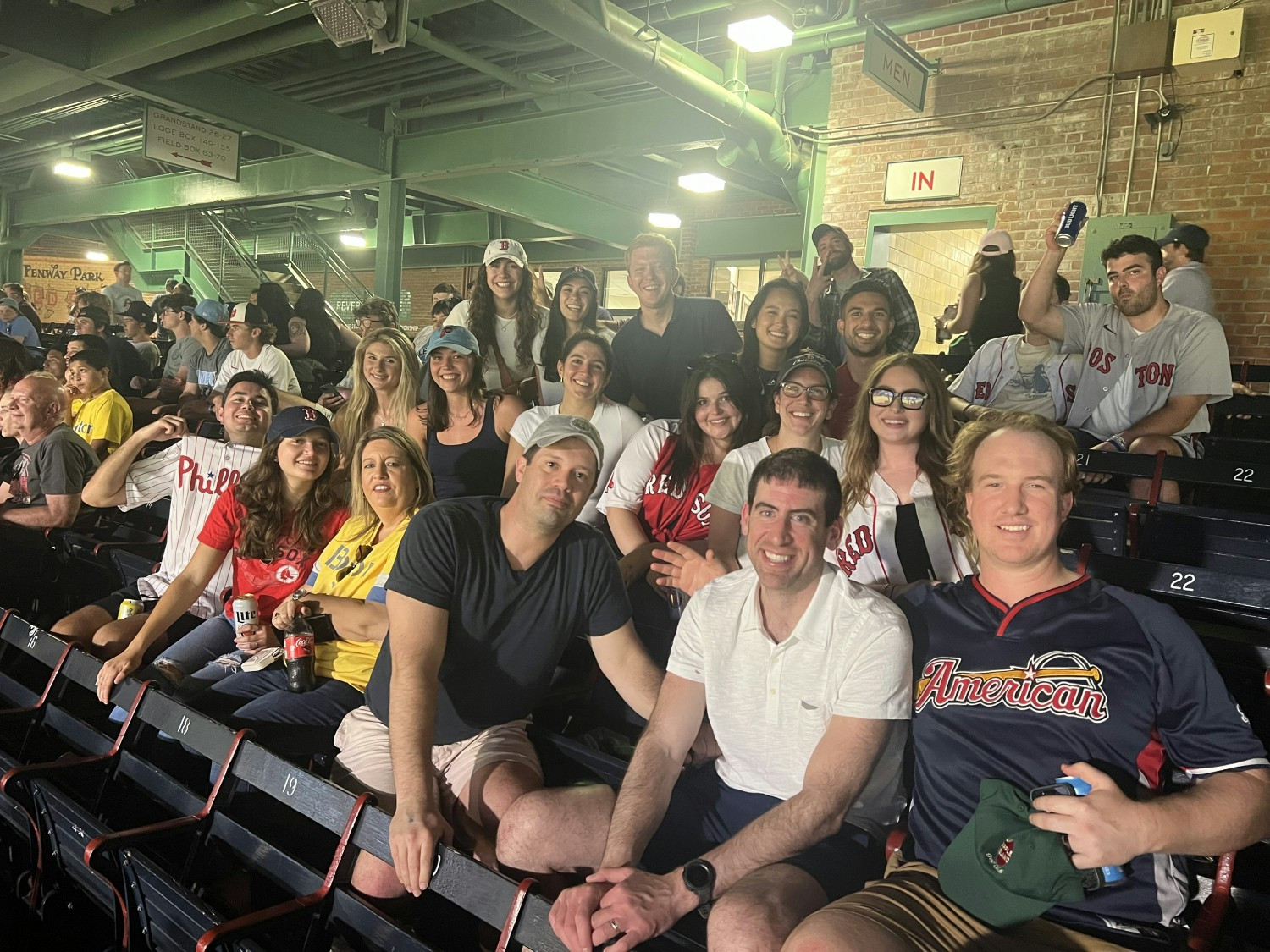 Invisors Boston teammates enjoying a baseball game together