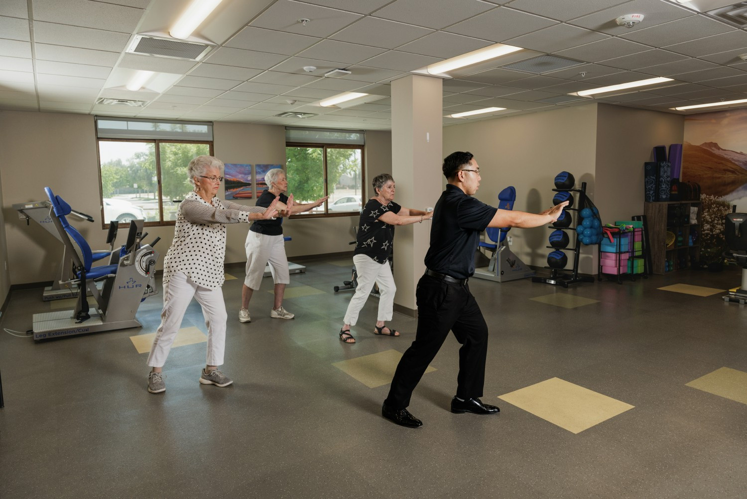 Fitness Director teach Tai Chi class