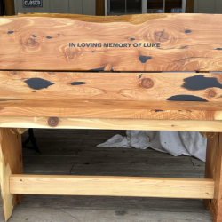 One of our homeowners lost their son before Christmas last year. The team had this bench custom created to honor him. 
