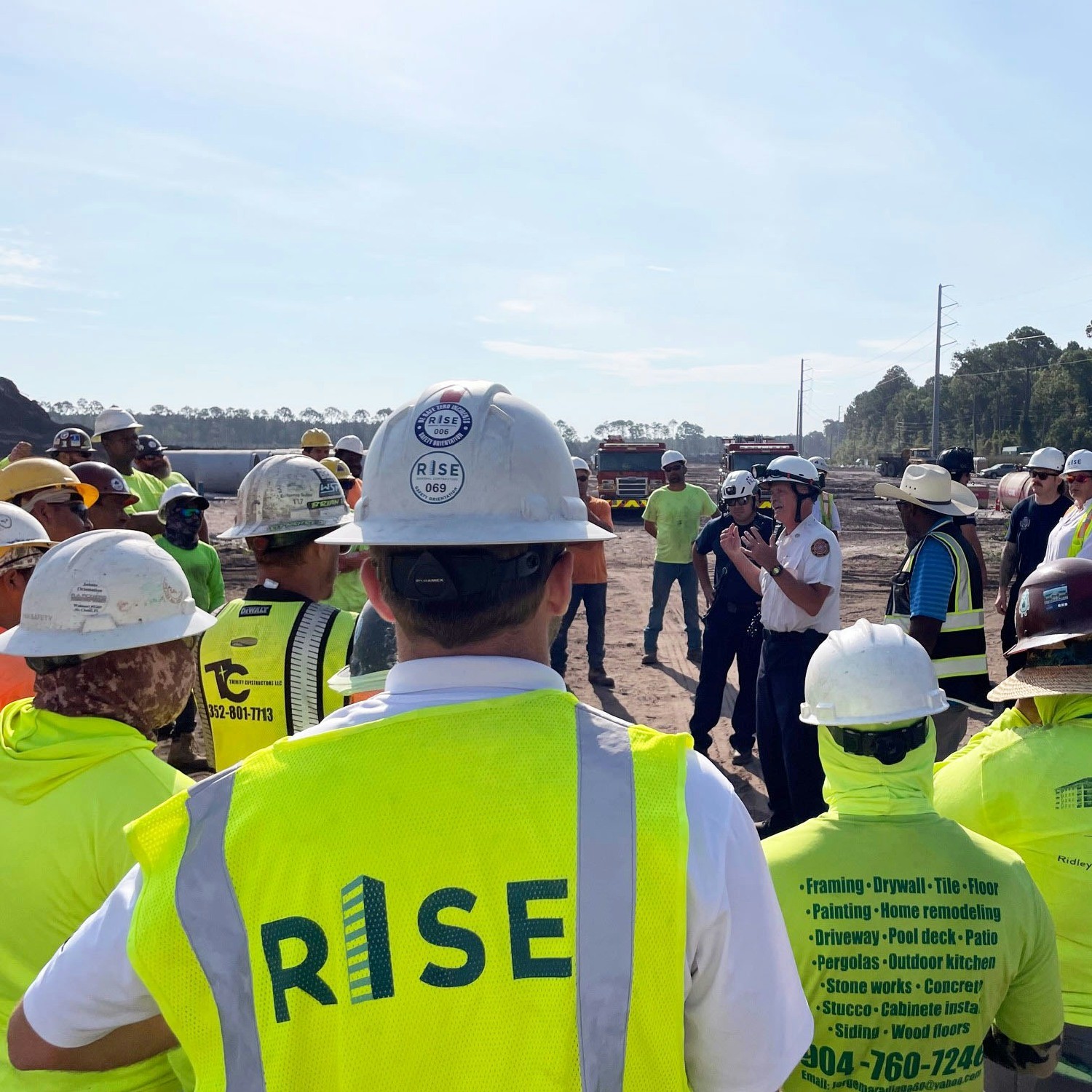 RISE Construction getting briefed at a safety stand-down meeting.