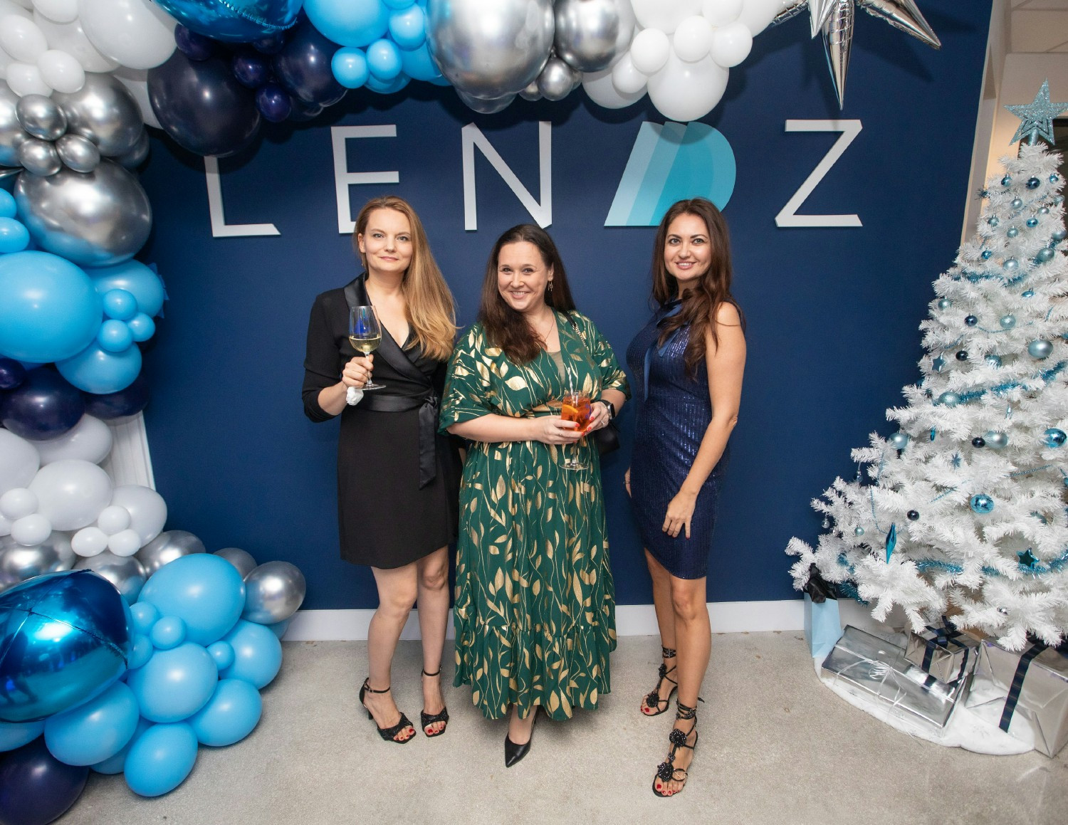 Ladies from our Finance and Closing departments pose together during our annual Lendz Holiday Party.