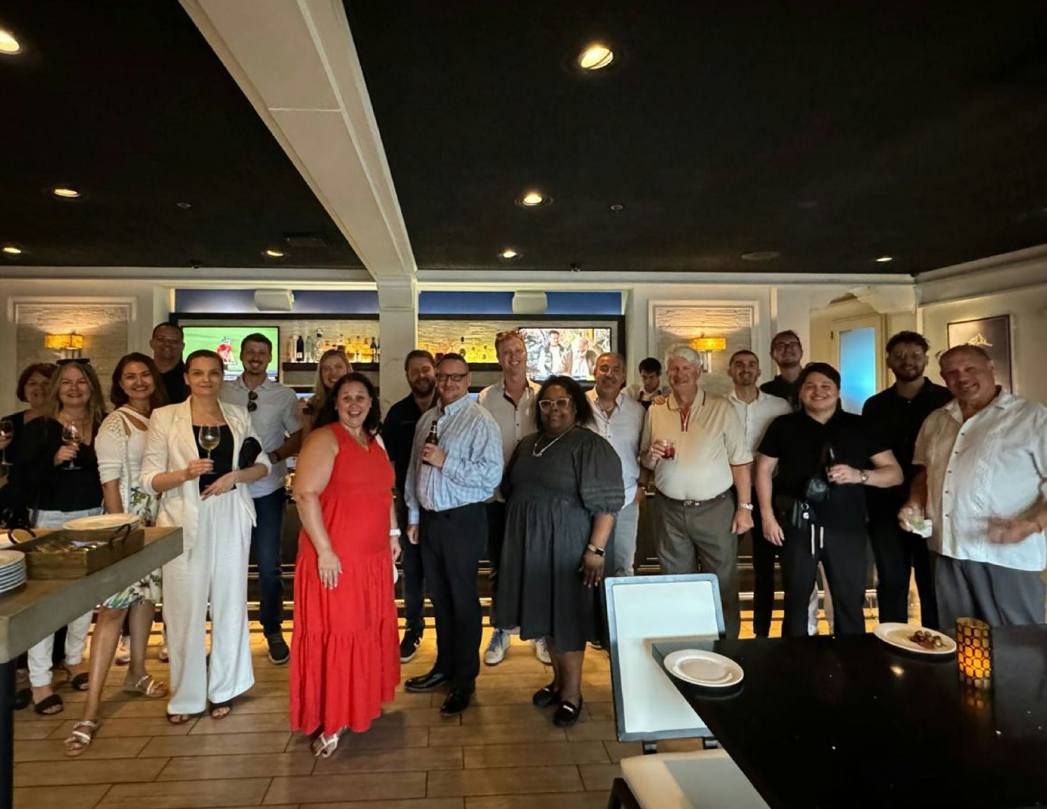 Our Fort Lauderdale team enjoys a mid-week Happy Hour together down the street. 