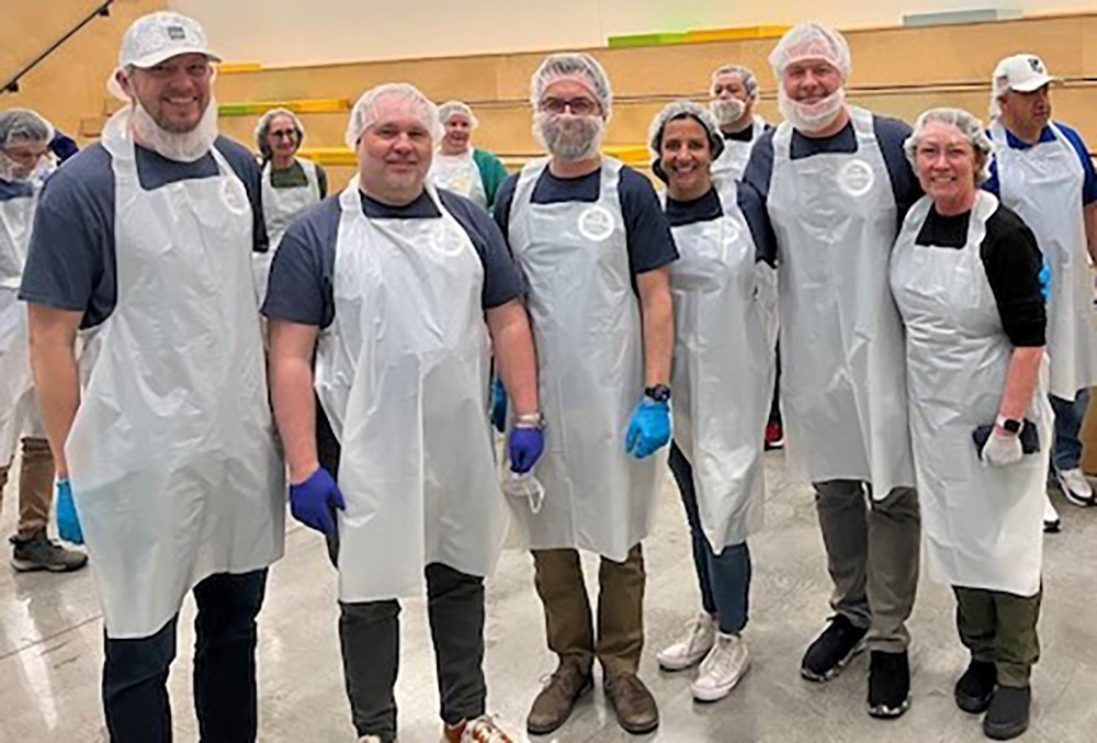 “One Adstra”:  Illinois Associates volunteering at Feeding America of Chicago.