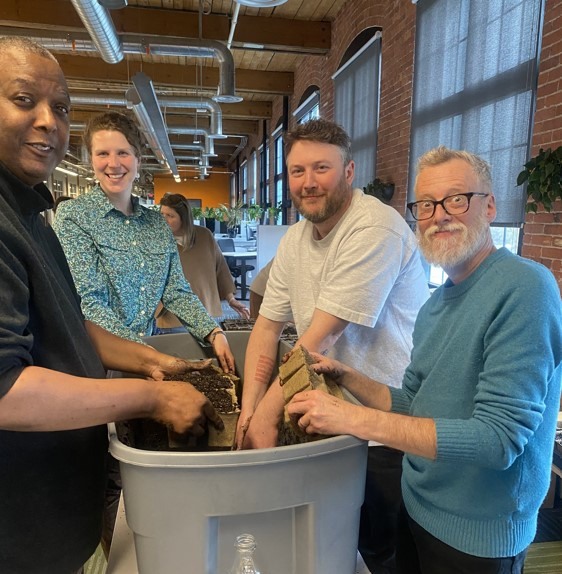 Employees participating in a Gardening workshop