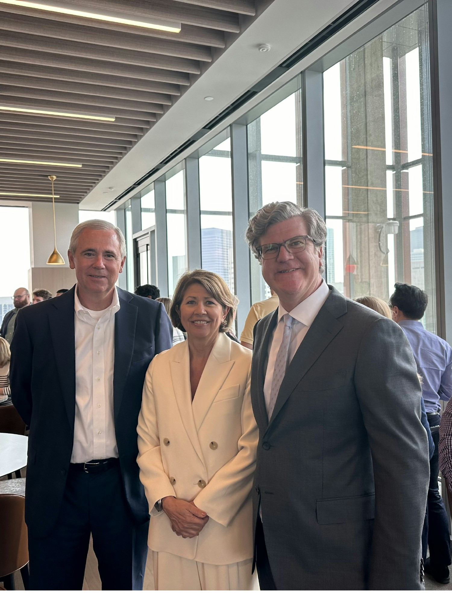 Norton Rose Fulbright leaders celebrate the Houston office's relocation to a new Discovery Green high-rise.