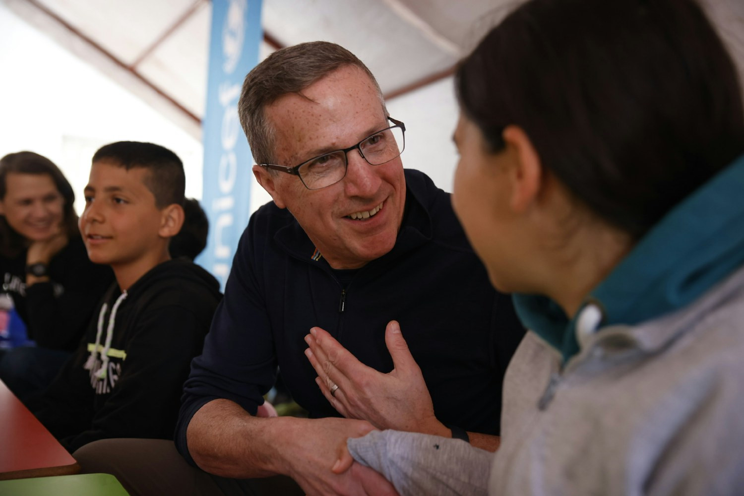 UNICEF USA's President & CEO visits a child-friendly center where young people find relief after a earthquake. 