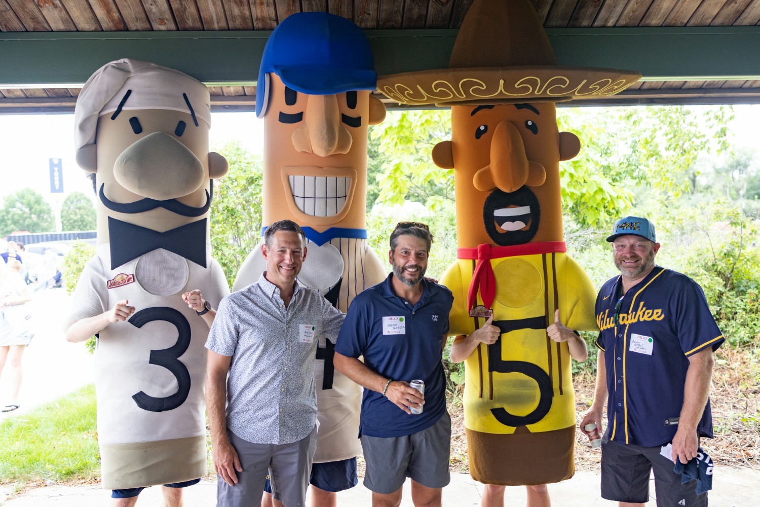 InCheck's partners meet the Milwaukee Brewers famous sausages at a baseball game event celebrating 20 years of InCheck. 