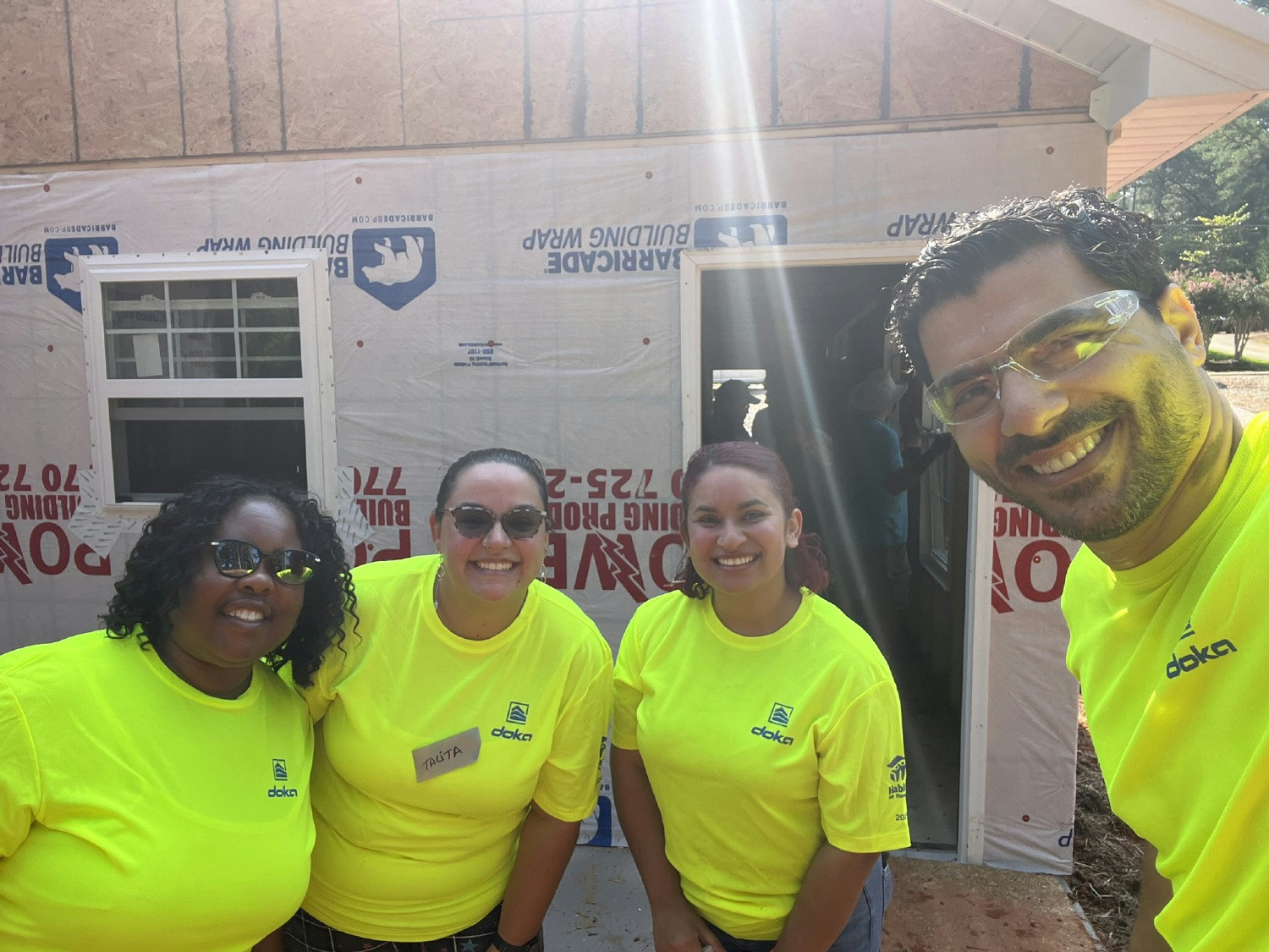 Members of our Southeast (Atlanta) team volunteering with Habitat for Humanity