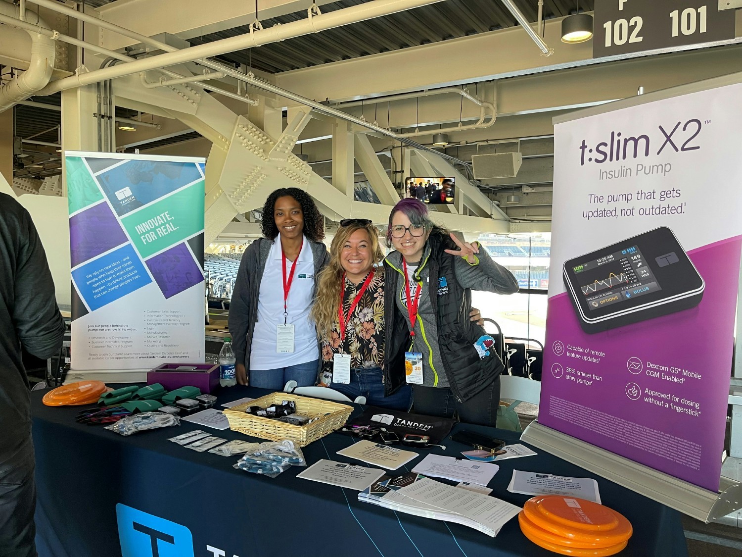 Three employees from our Software Test Engineering team at a community recruiting event.