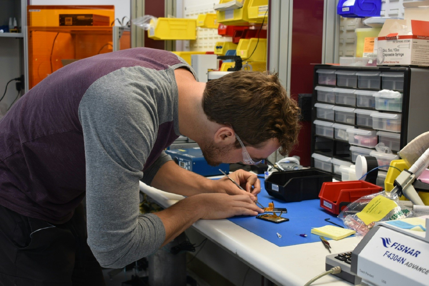 Mechanical Engineer testing components of the insulin pump in our lab in San Diego. 