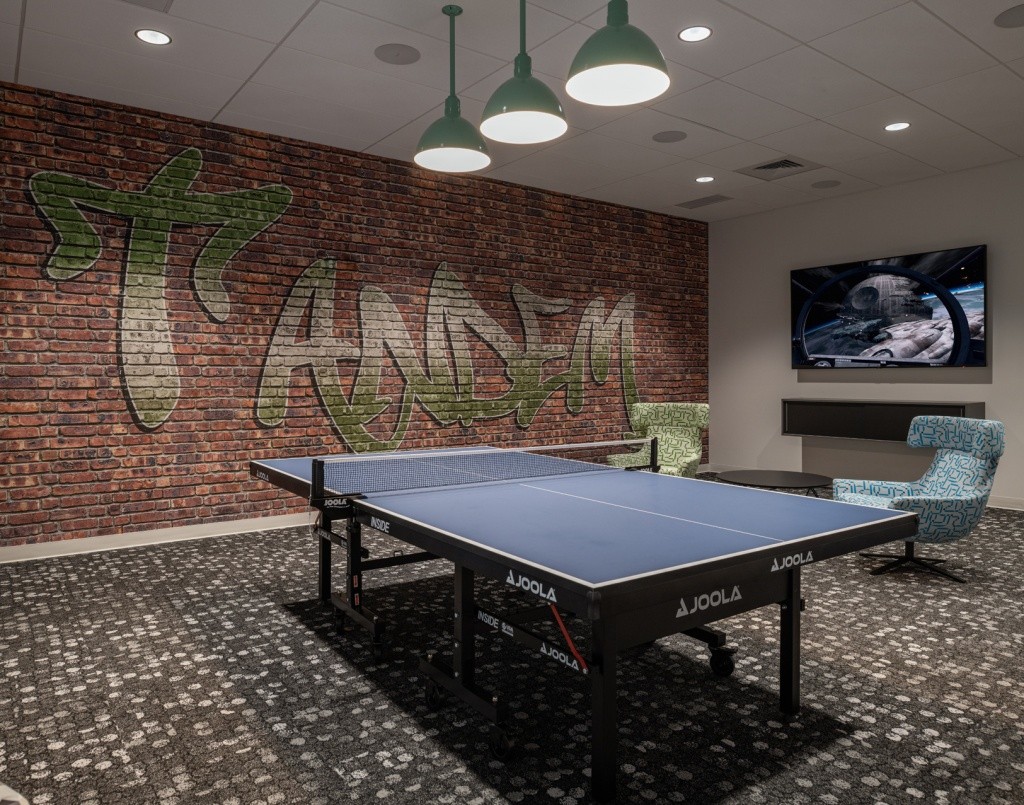 Our Tandem graffiti wall and lounge area at our Boise Office.