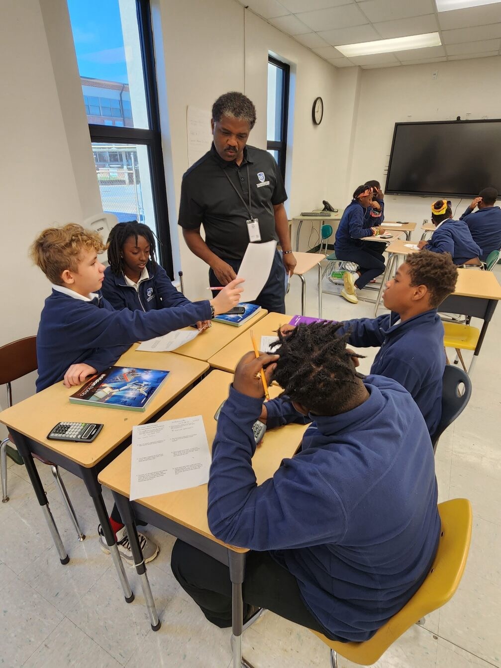 Students at Warrenton Prep Academy  in Pensacola, FL take part in small group activities to develop math skills.