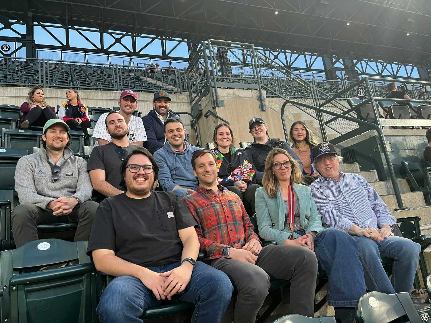 Team members came together in person to bond over a Rockies game in Denver, CO.