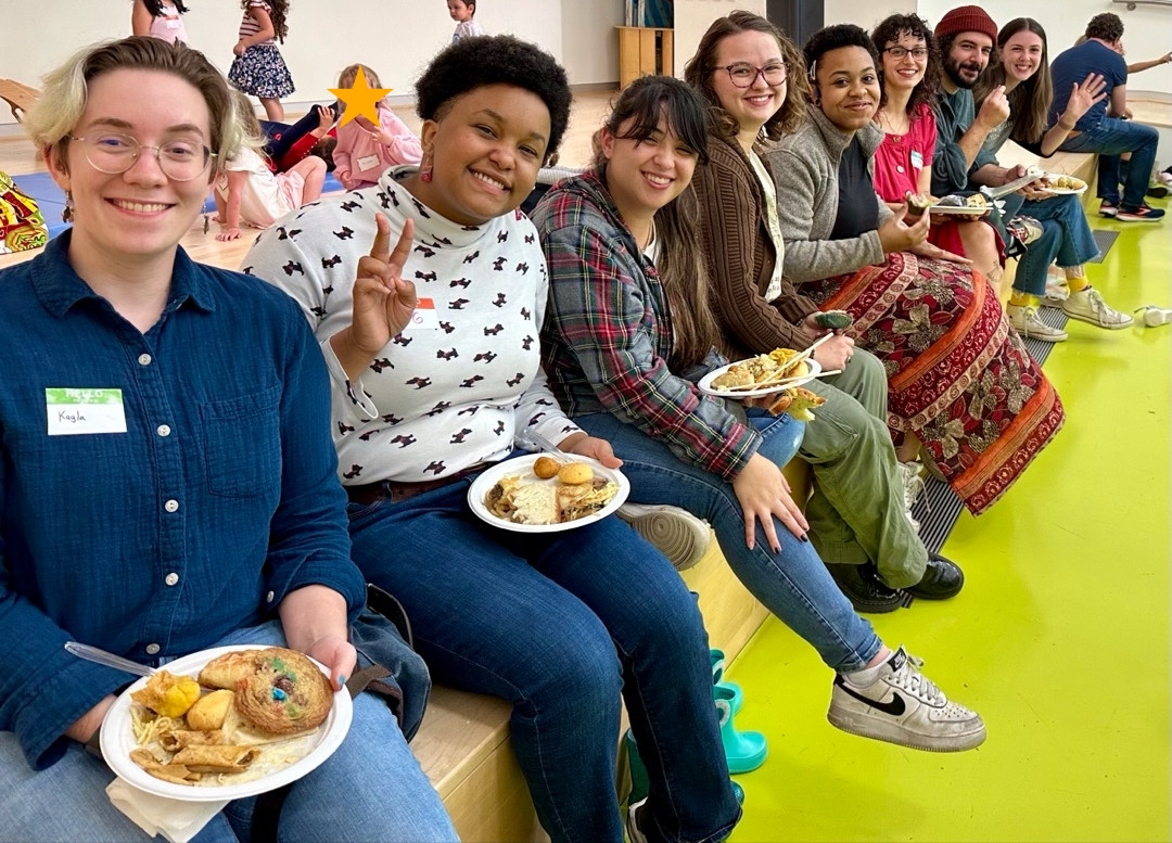 Staff and friends enjoy amazing flavors at the International Food Festival. 