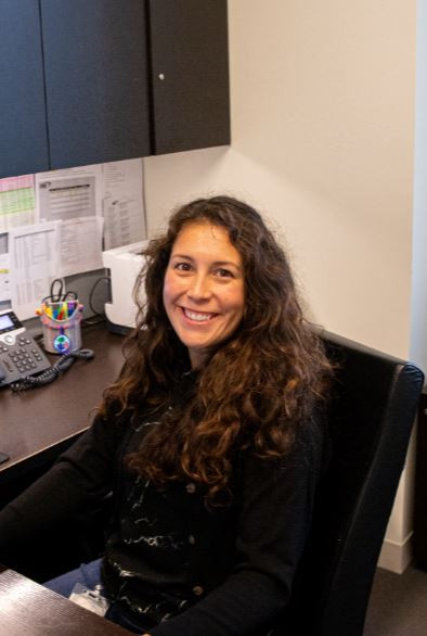 Employee working in her office space.