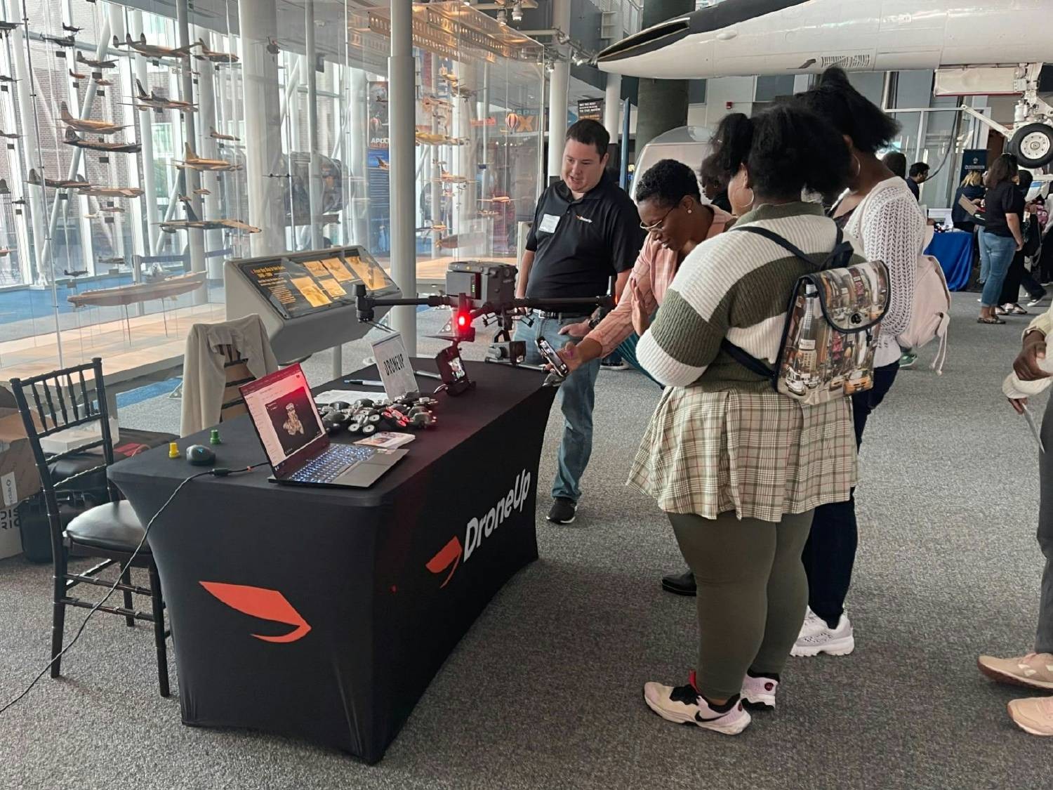 DroneUp hosted a booth for a STEM Career Day at the Virginia Air and Space Center to speak with students K-12