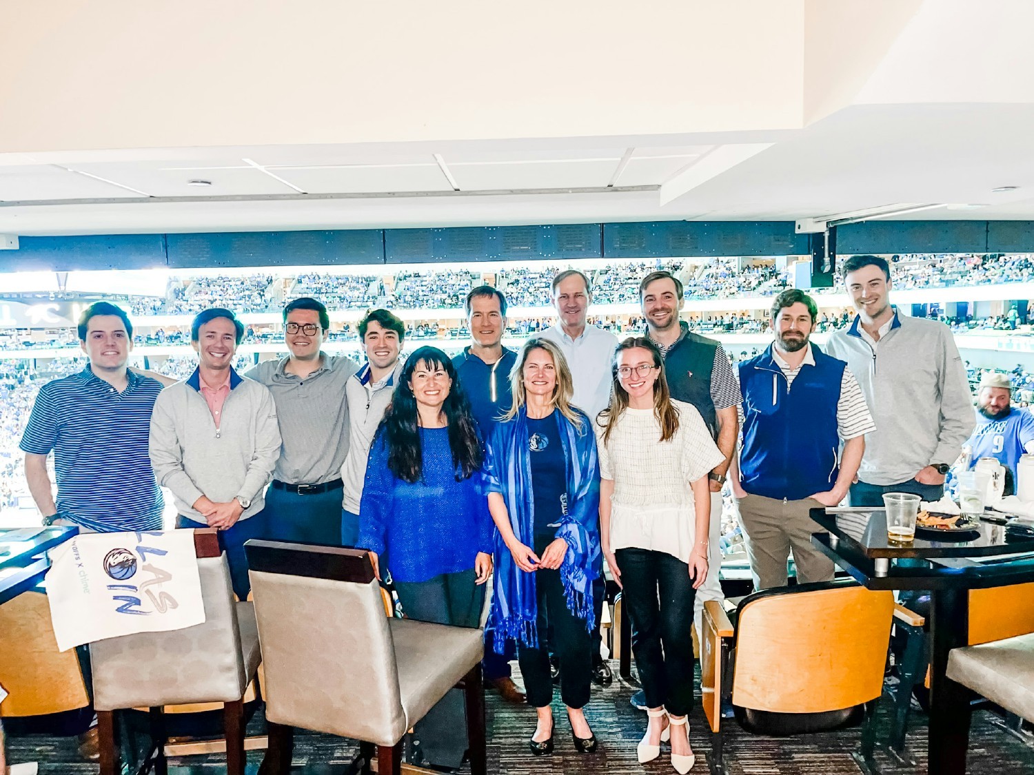 Members of the team attending a Dallas Mavericks basketball game. This was one of our monthly culture events. 