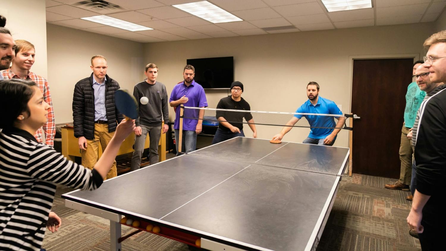 The Concord team shows off their competitive core value in a ping-pong tournament.