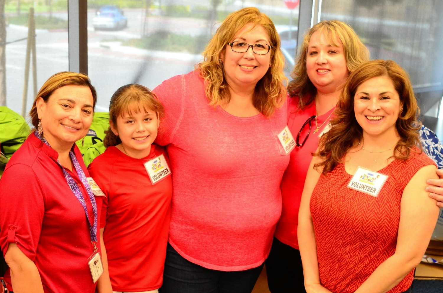 It's a family affair - staff bring their children to volunteer at our community events. 