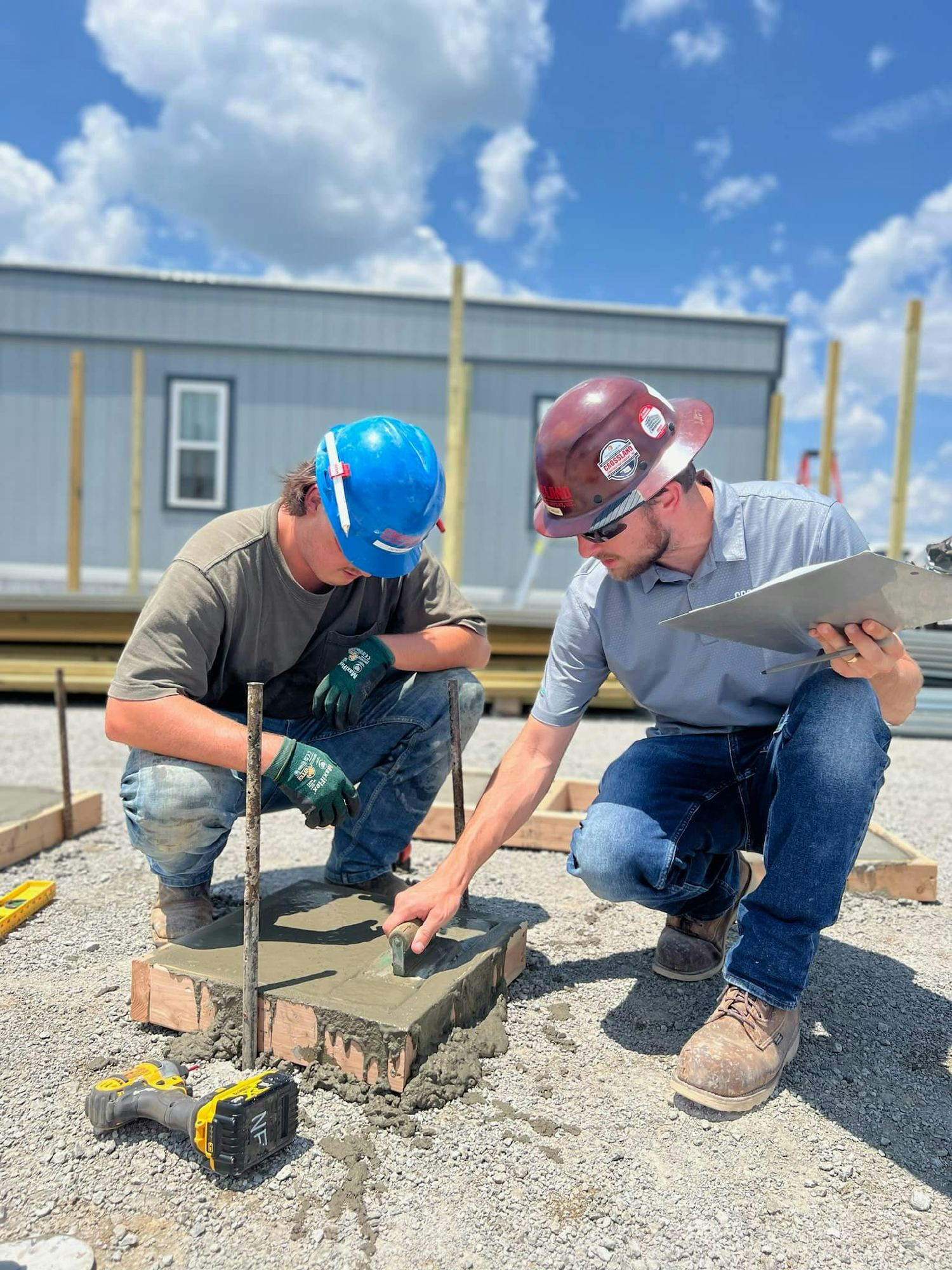 Superintendent helping an Intern on a jobsite