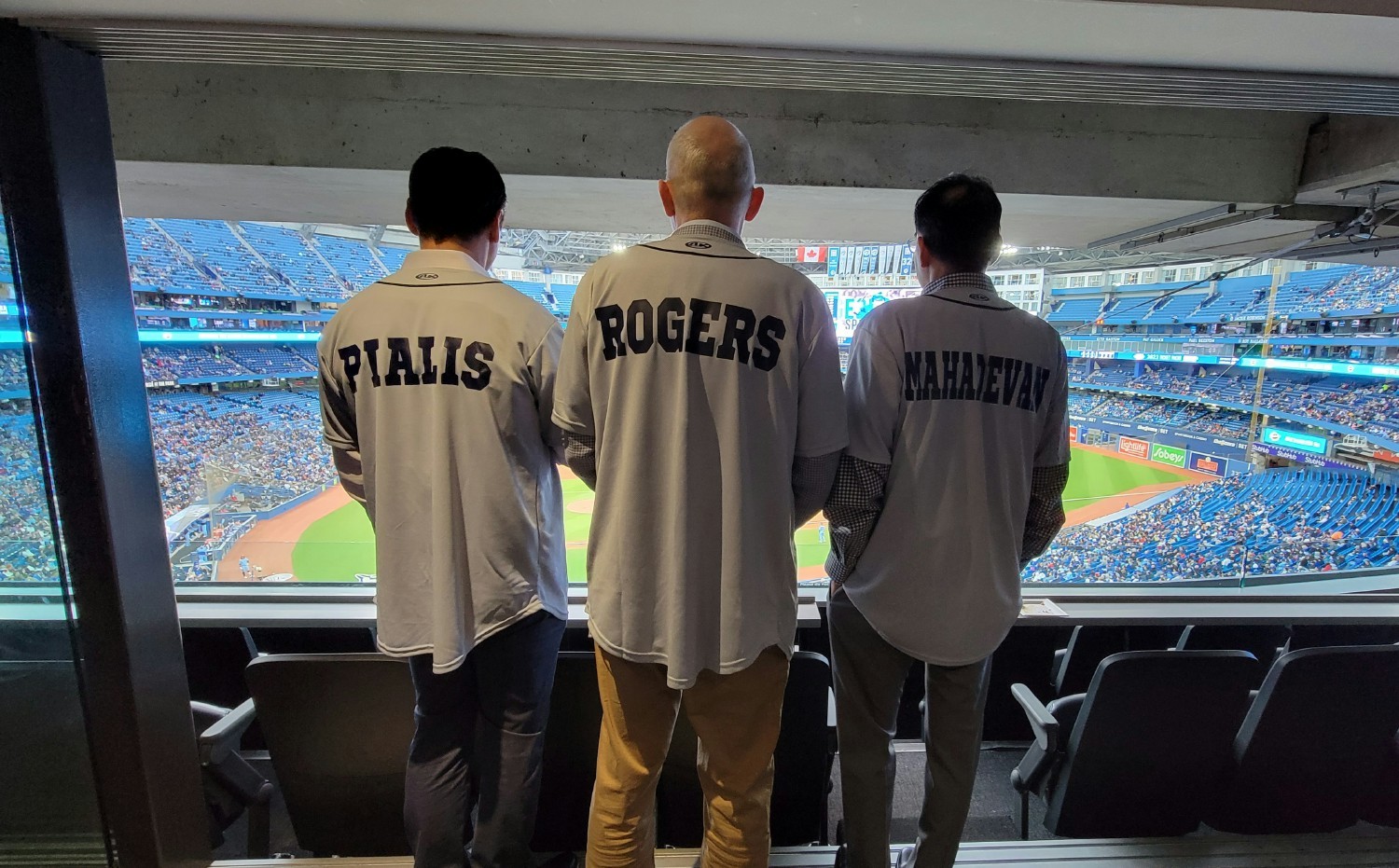 Tony Pialis, Jonathan Rogers, Raj Mahadevan co-founders at team baseball event. 