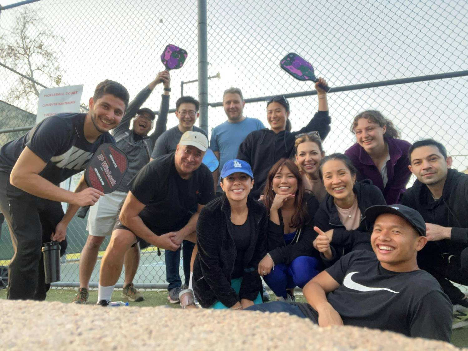 Teamwork on and off the court! Celebrating our wins and having fun with a friendly game of pickleball.