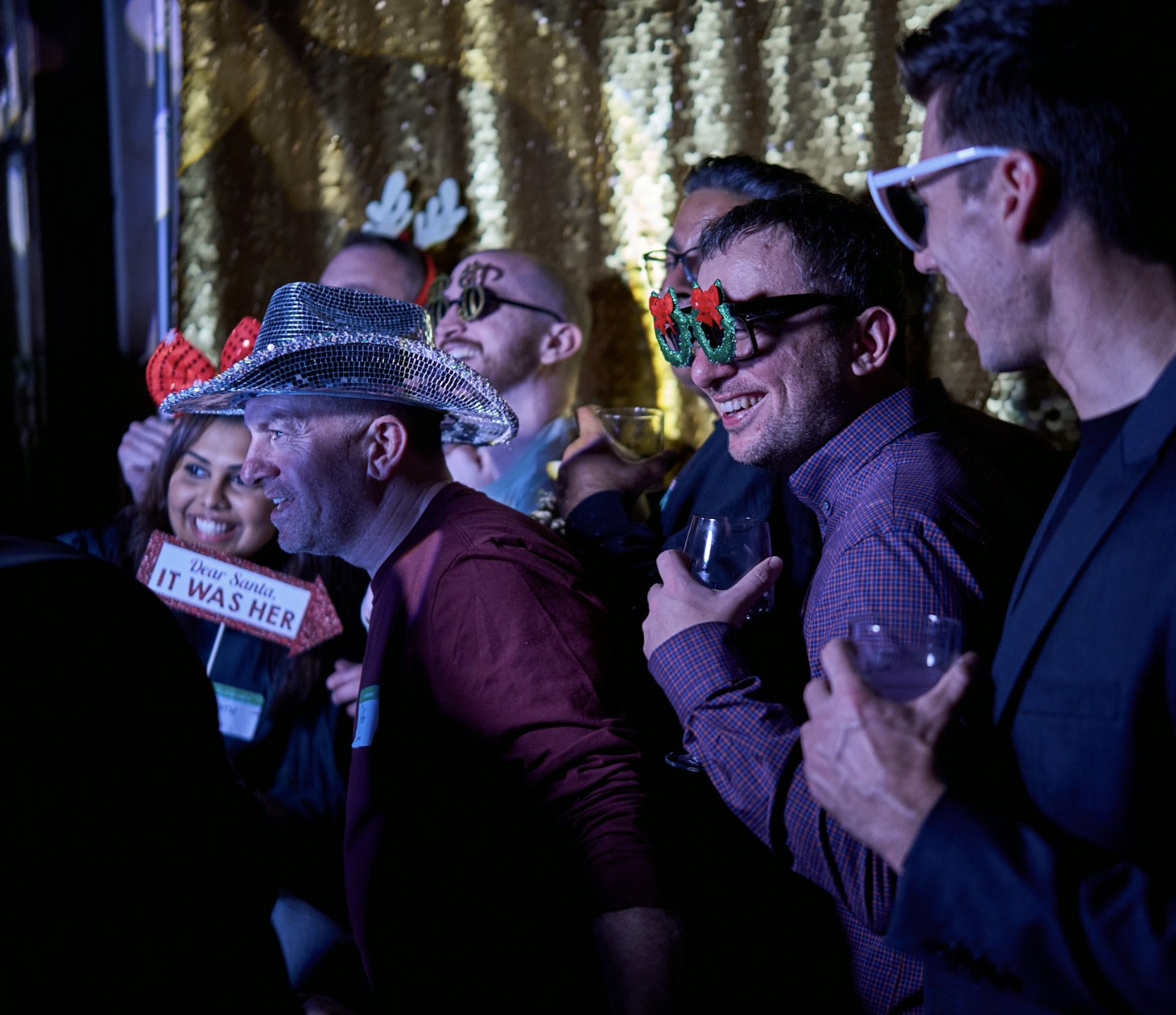 US Chronauts take photobooth pictures during our 2023 end of year party in Austin, Texas. 