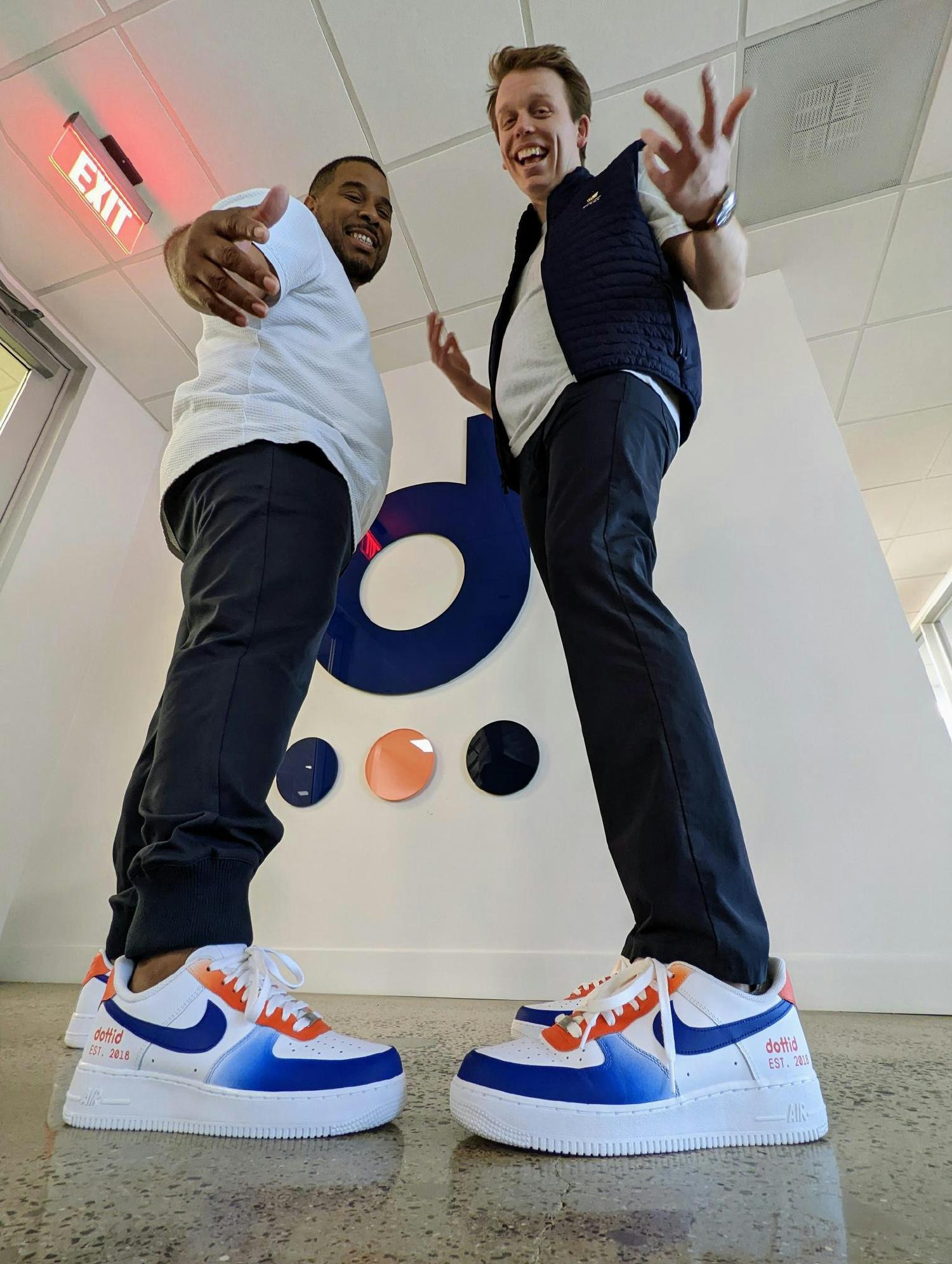 Dottid's CEO and Founder, Kyle Waldrep, and CTO and COO, Senecca Miller, sport custom Dottid Nike Air Force Ones. 