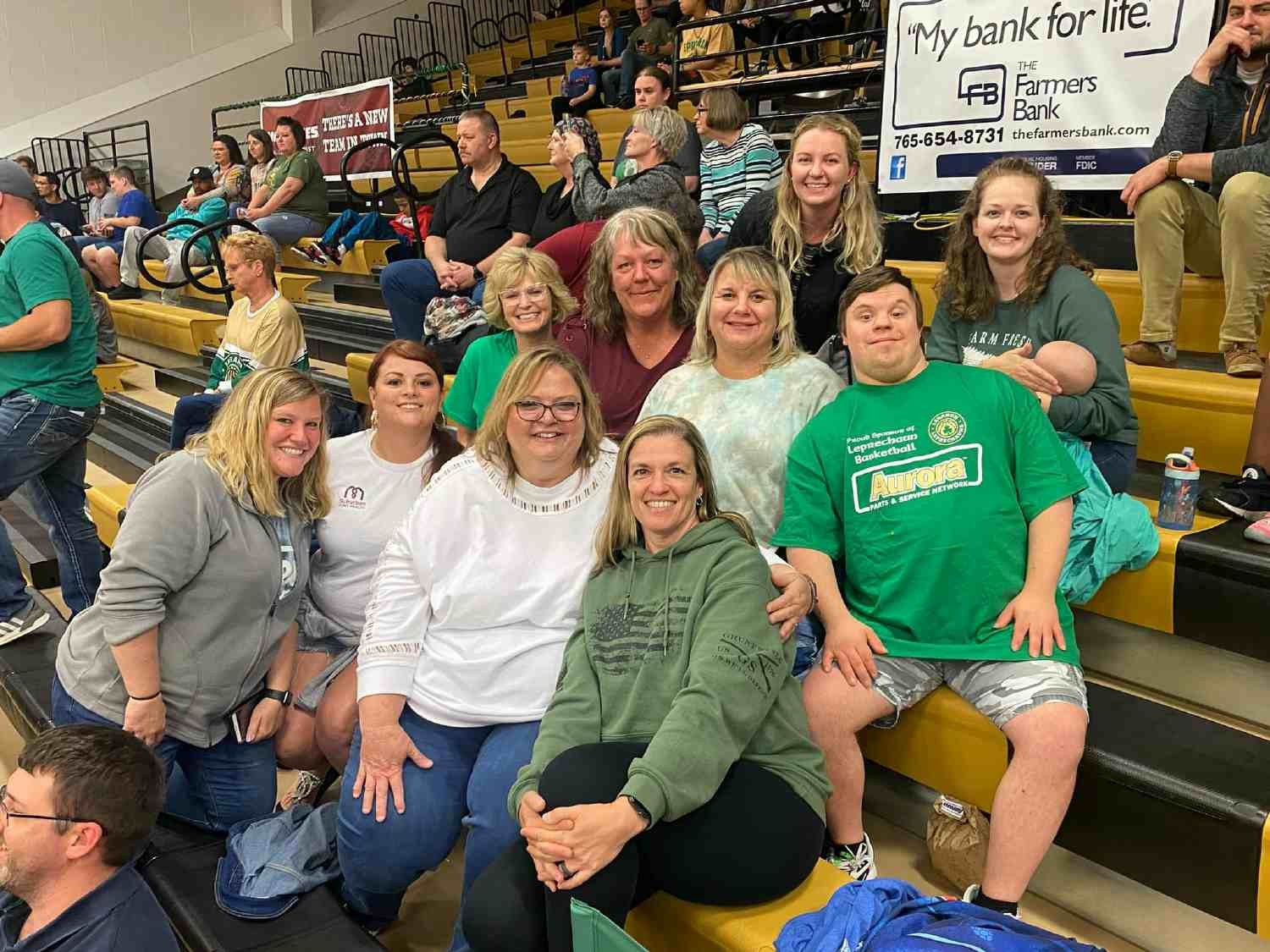 Our team celebrating at a local basketball game