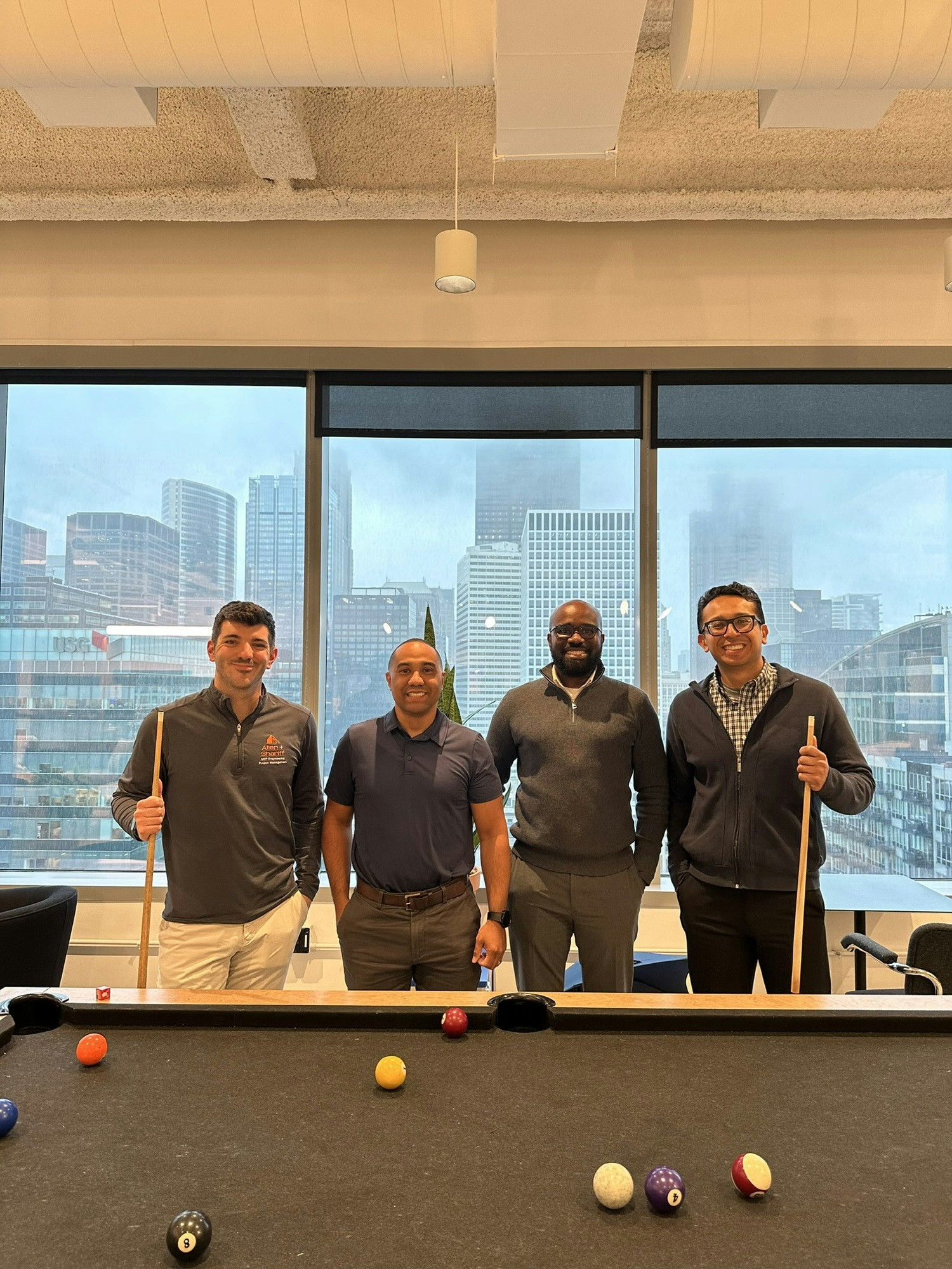 Chicago office playing pool in their building