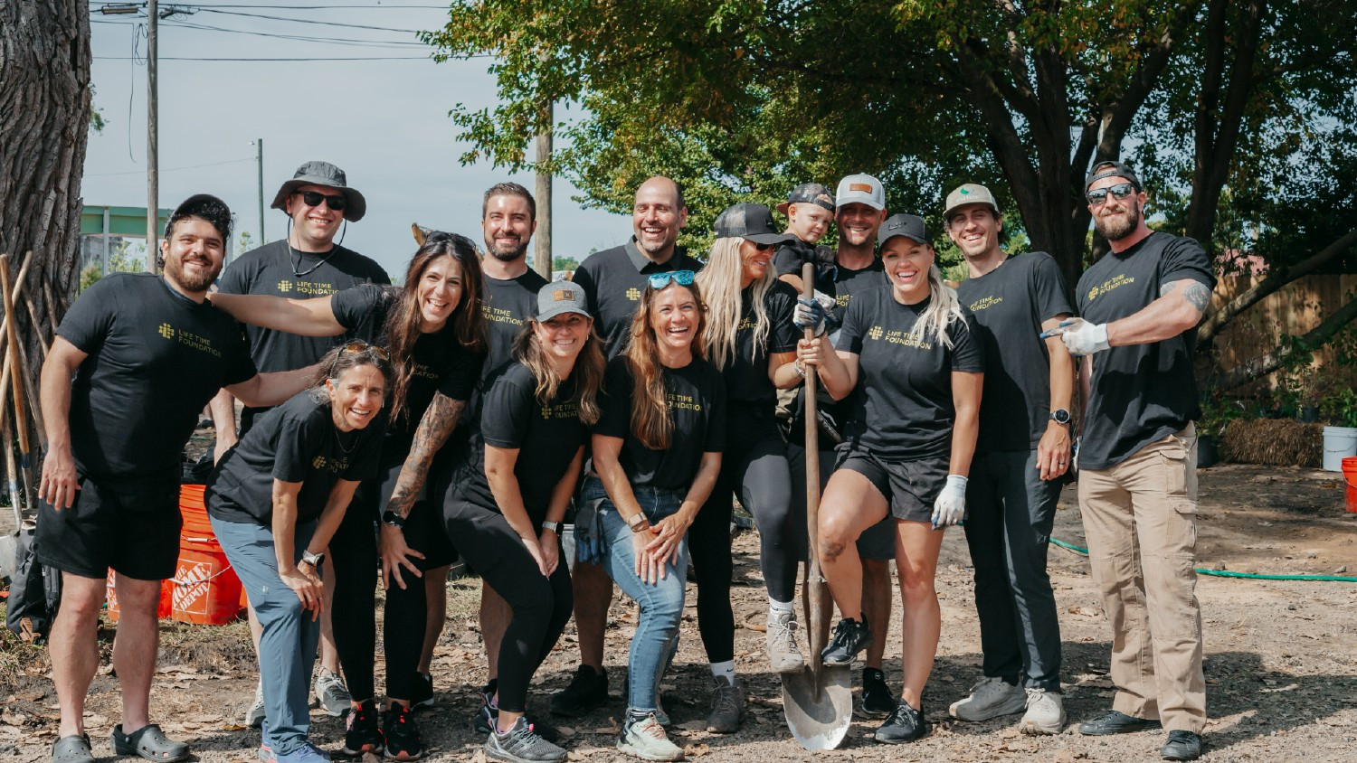 Team Members from our Detroit area clubs volunteering for a tree planting event in the local community