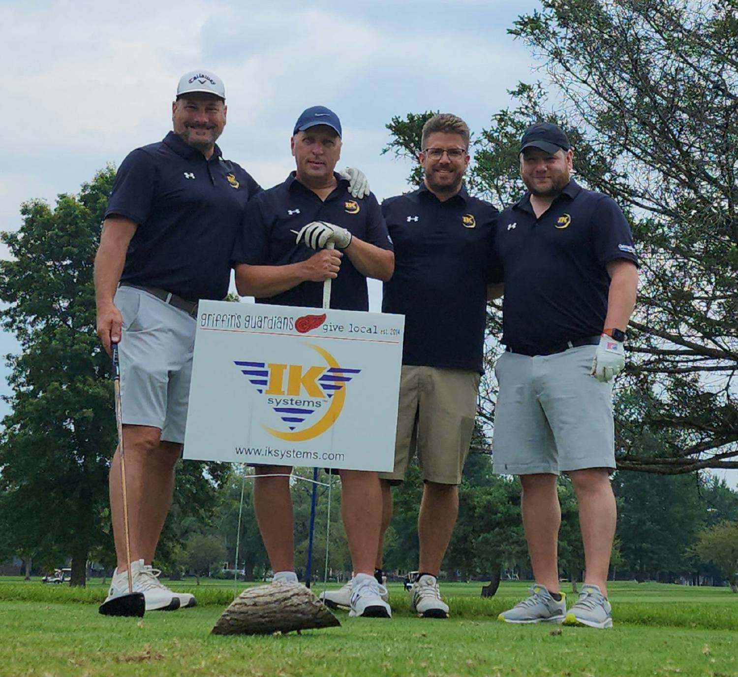 A group of employees at the Griffin's Guardian's golf tournament, a not-for-profit close to one of our employees hearts.