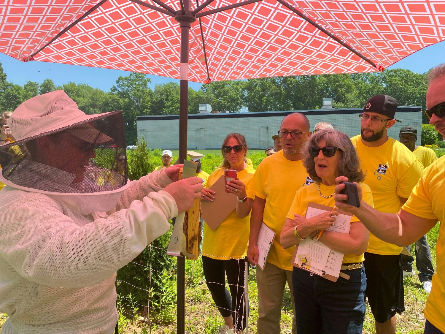 A beekeeper from The Best Bees Company provided a close look at our bee neighbors at an employee appreciation event.