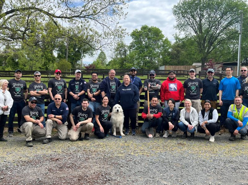 COPT Defense Team Members volunteering at the Fairfax Humane Society.