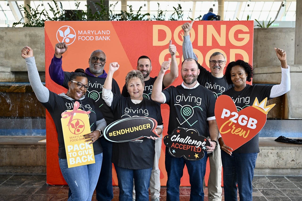 Members of the COPT Defense Team volunteering at the Maryland Food Bank's Thanksgiving food drive. 