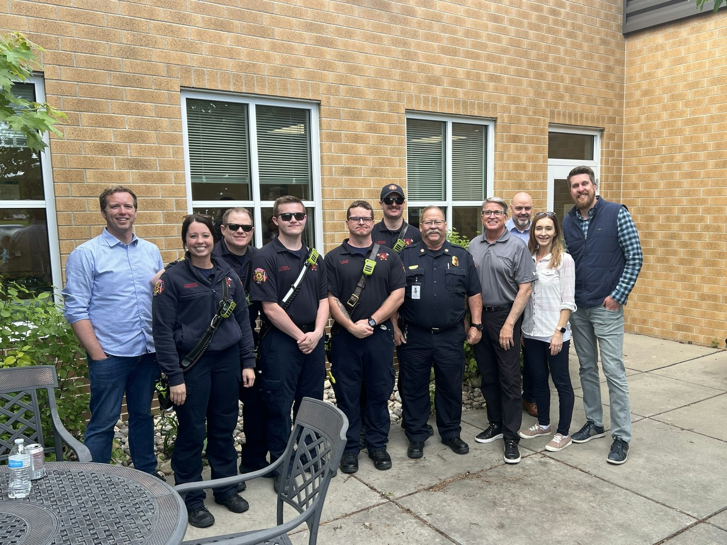 Our operating company, Moore Engineering, Inc, serving burgers to the West Fargo fire department serving our community.