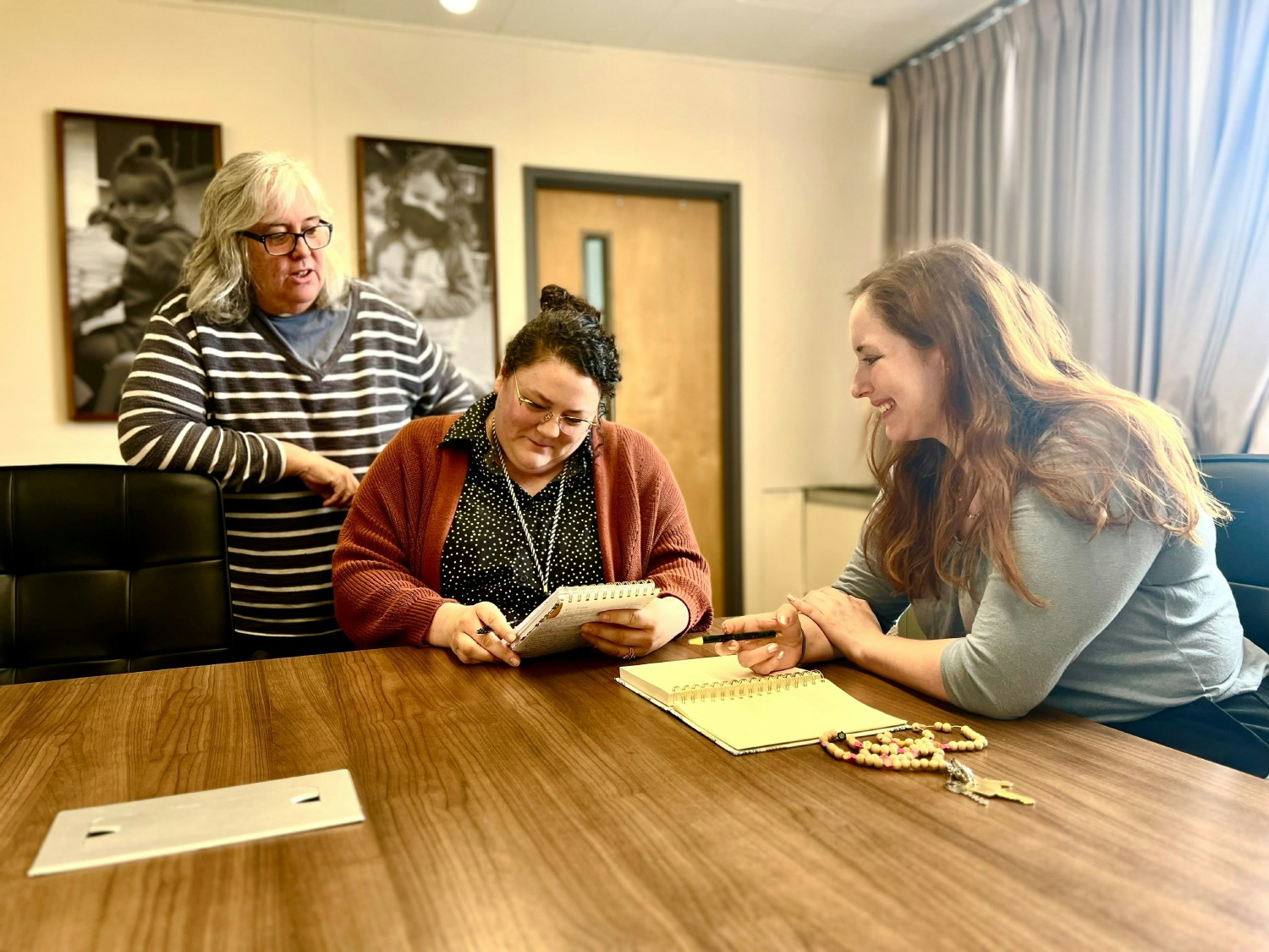 Berkshire County Head Start staff, Maggie Steele, Brittany Kratka, and Chloe Solomon work on collaborative child plans. 