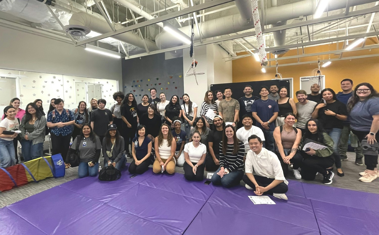 Cortica Glendale teammates attend a multidisciplinary training session in the center's specially equipped gym.