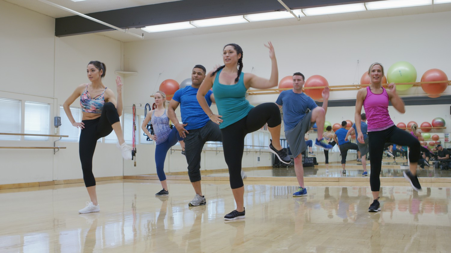 Land Fitness instructor leading a class with patrons at Garden Home Recreation Center