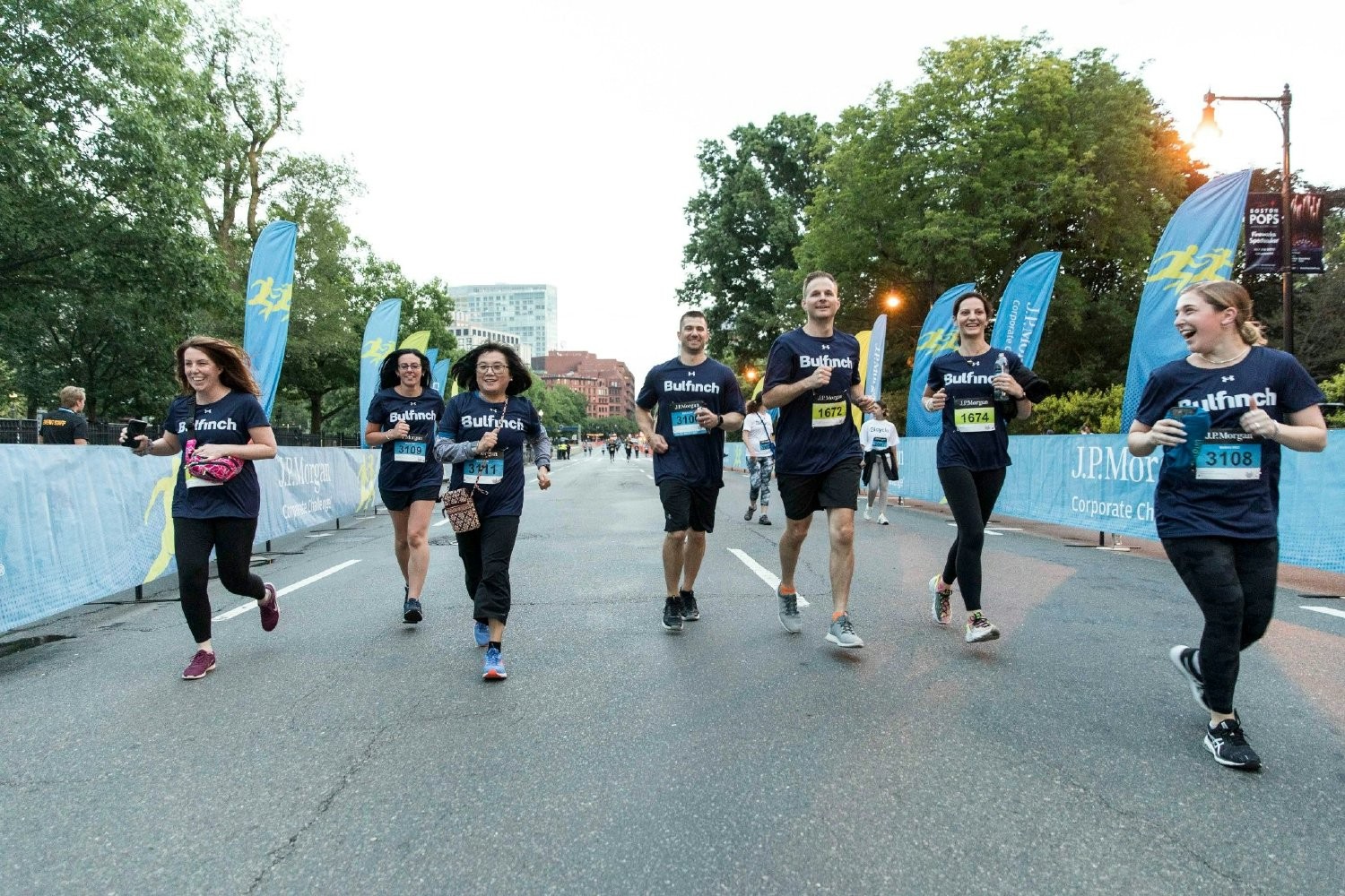 Bulfinch Team Members running the JP Morgan Corporate Challenge in support of merging work, team bonding, and wellness.