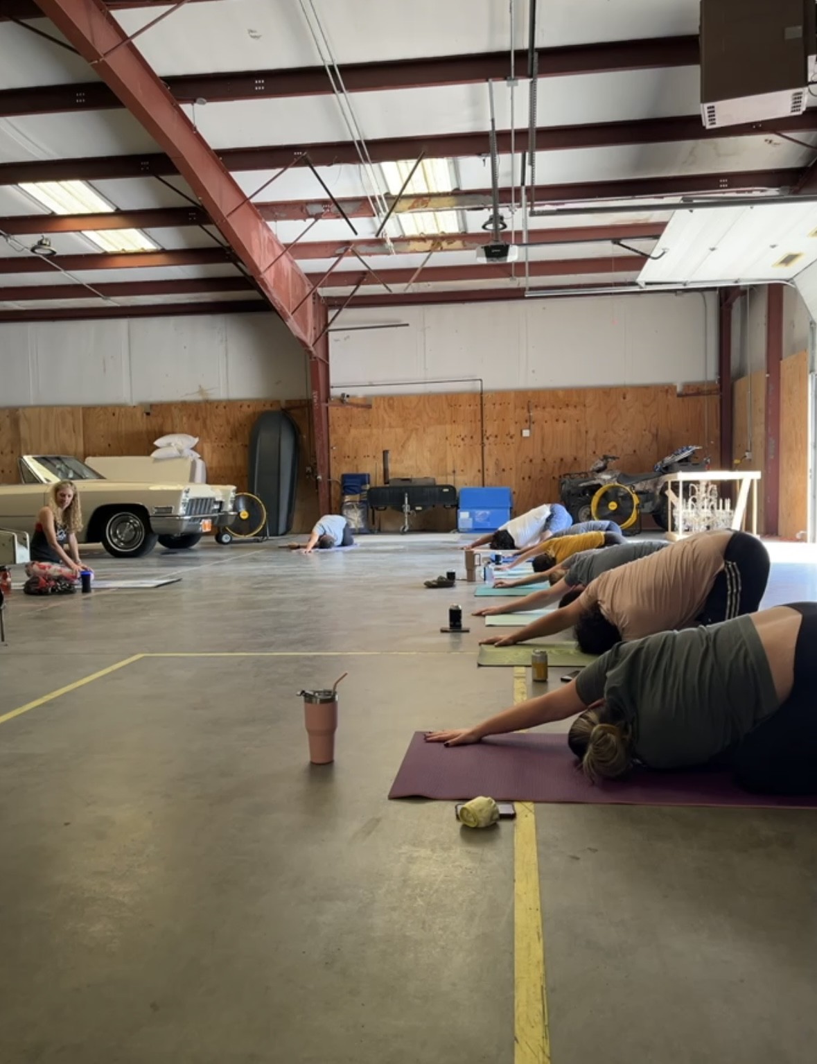 Team building activity of yoga during work one day.