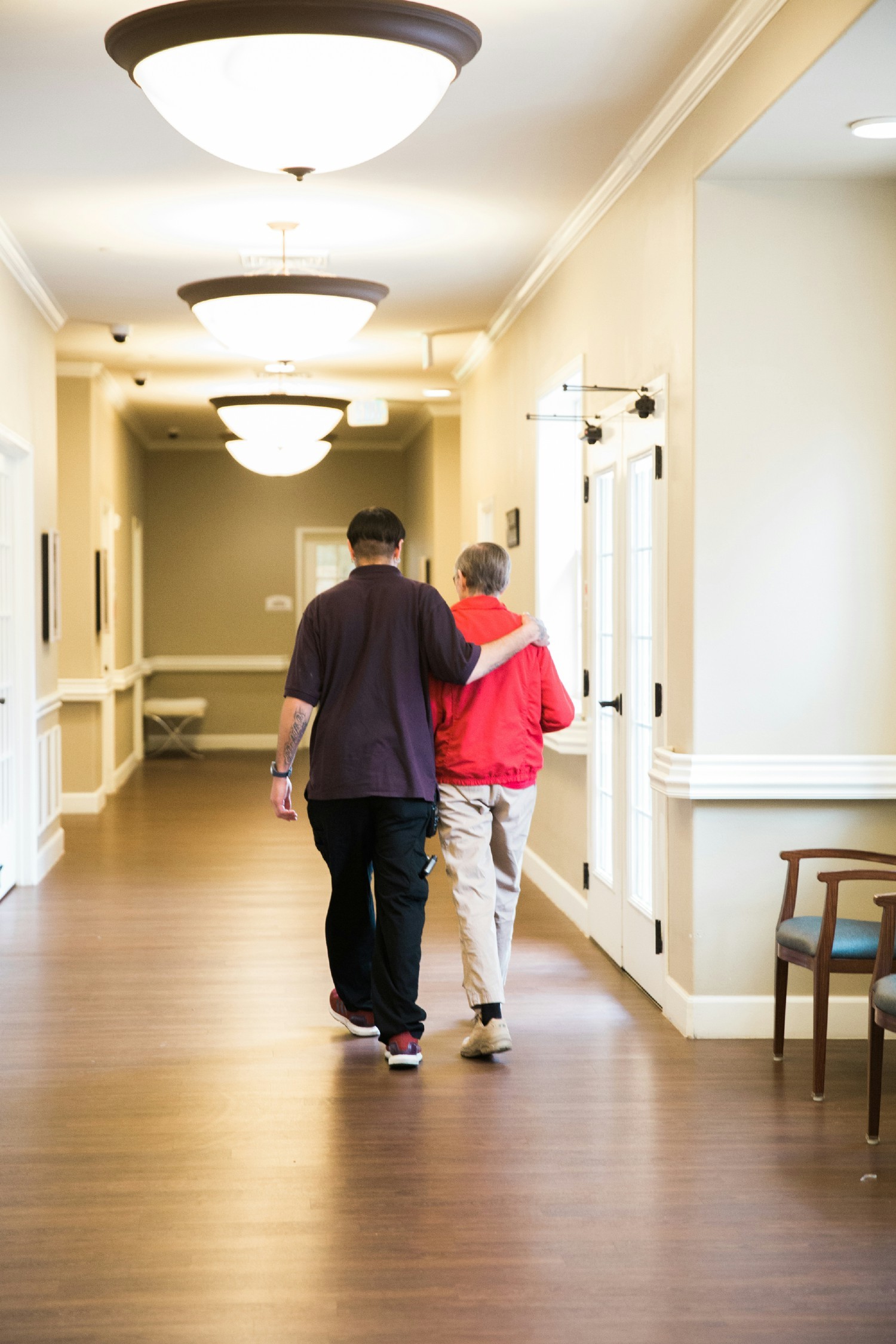 A quiet moment between a caregiver and resident