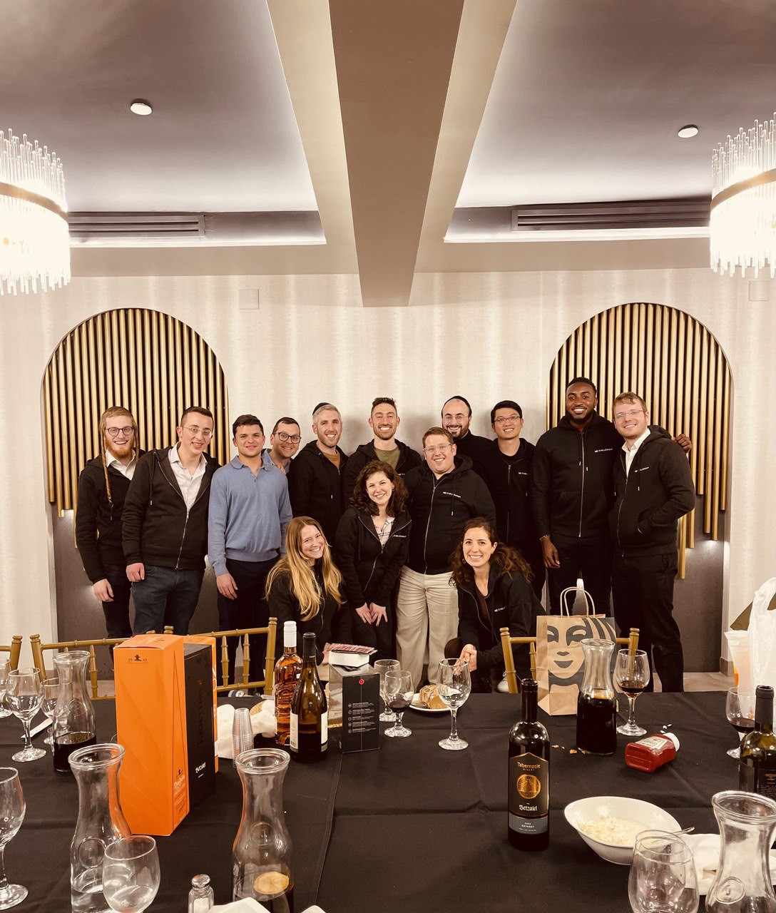 Our team coming together for dinner and drinks at our most recent holiday party