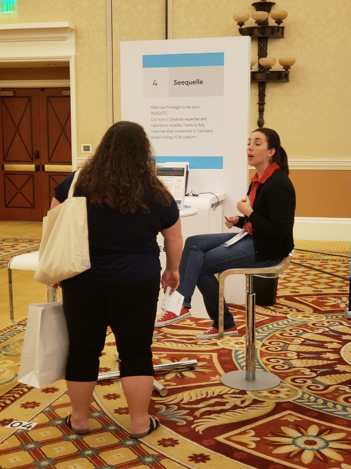 Meeting a prospect at one of our first booths at a partner customer conference