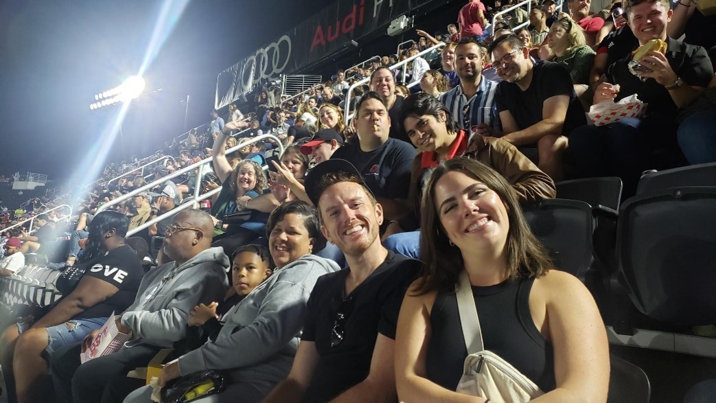 DC United Game photo.  Staff and guests were brought to the game and received additional funds for food and beverage.