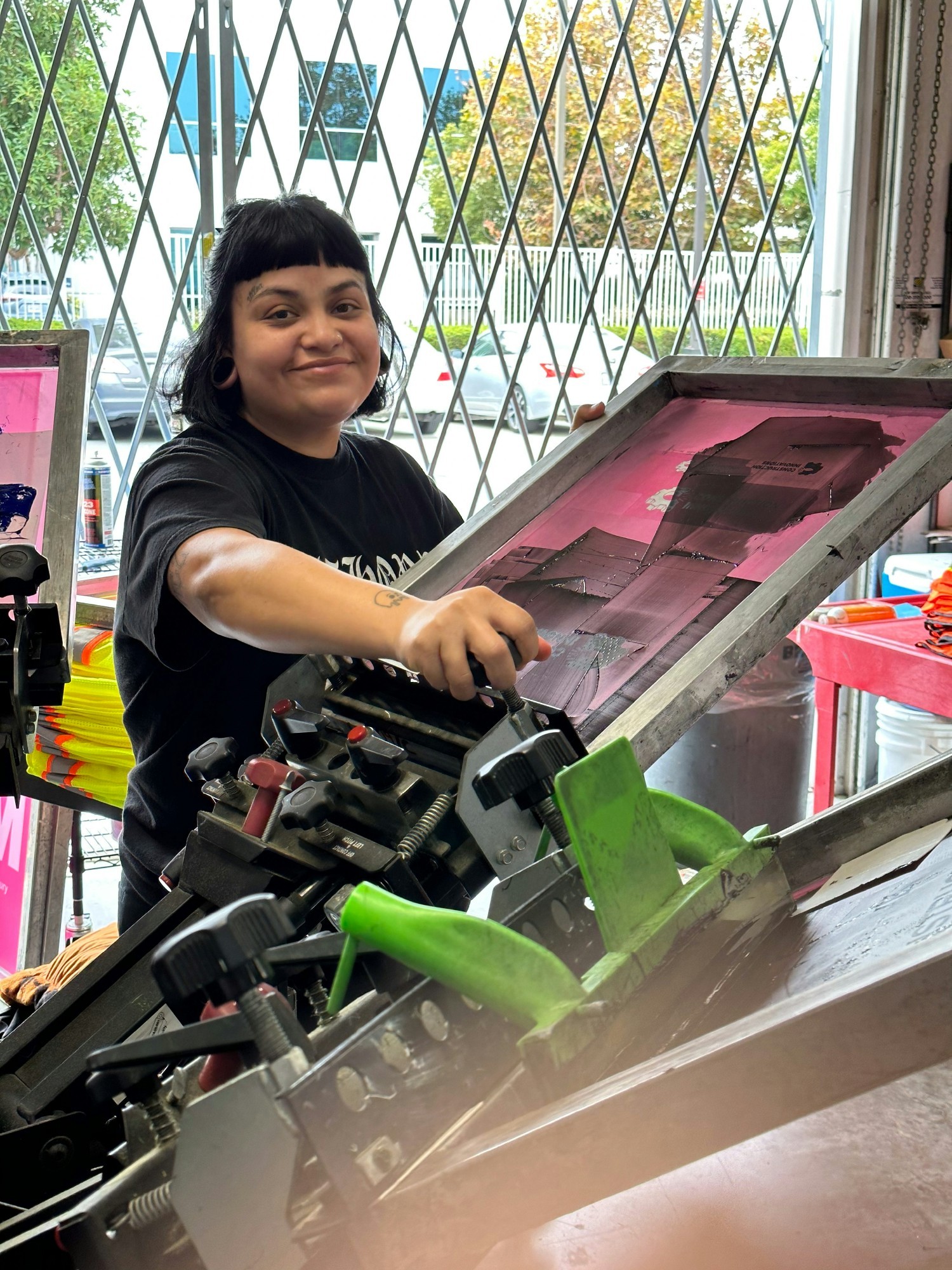 Screen printing our logo.