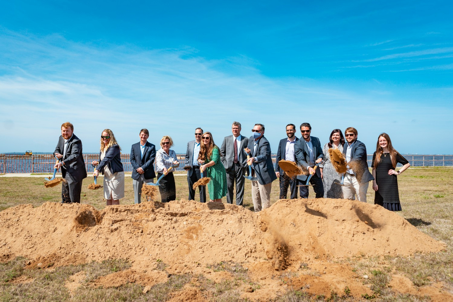 St. Joe team members and partners celebrating the groundbreaking of Hotel Indigo Panama City Marina, an IHG Hotel. 