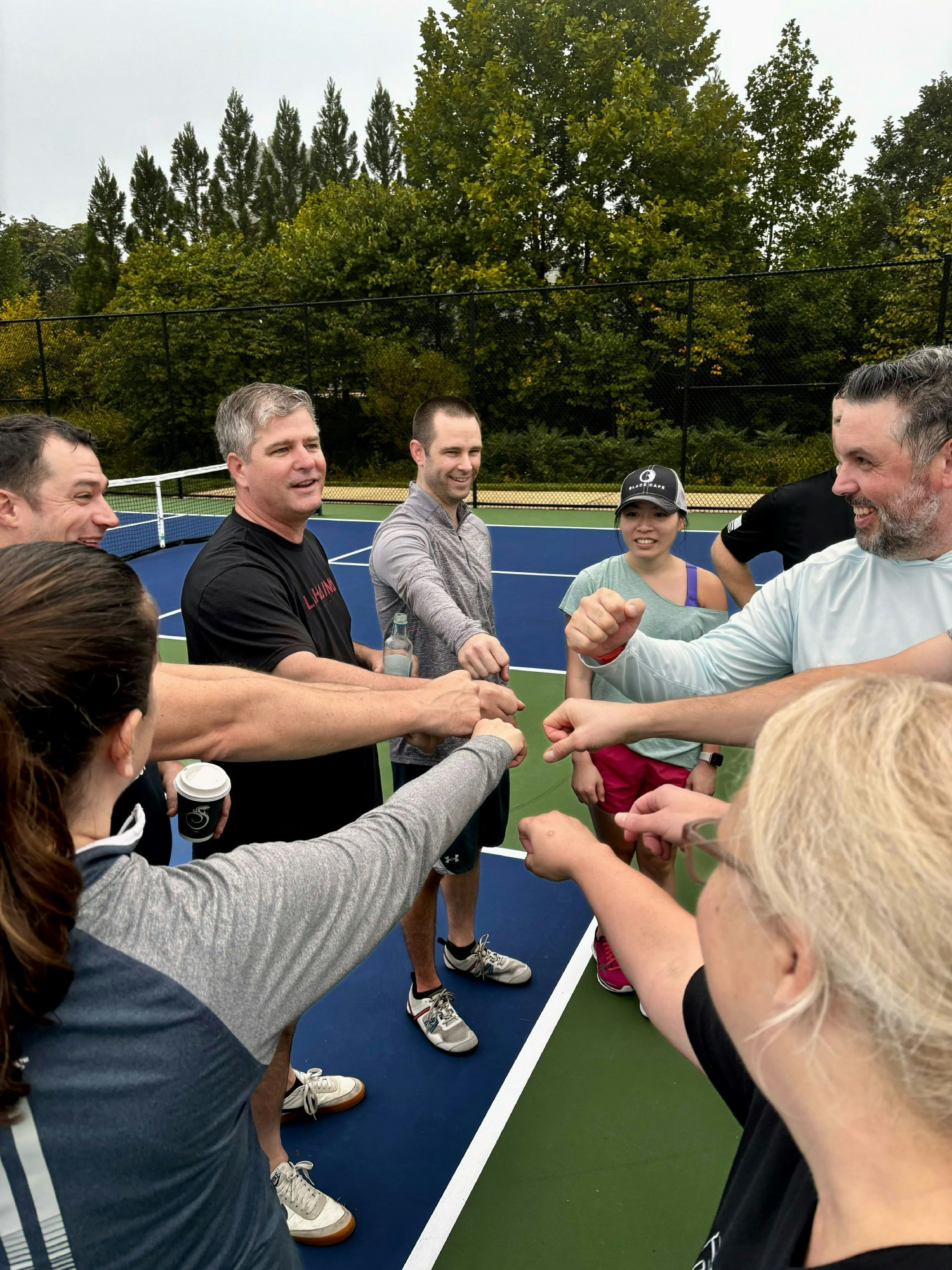 Celebrating the end of a successful pickleball tournament during a company retreat in Middleburg, Virginia.